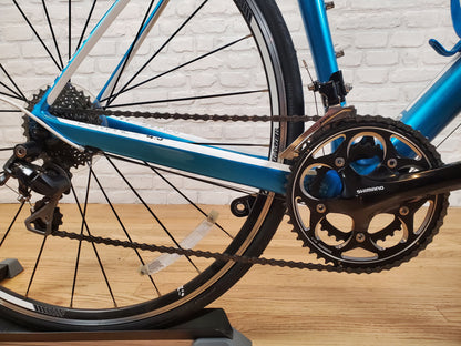 Close-up of Bontrager wheels and tires on Trek Domane 4.3 road bike