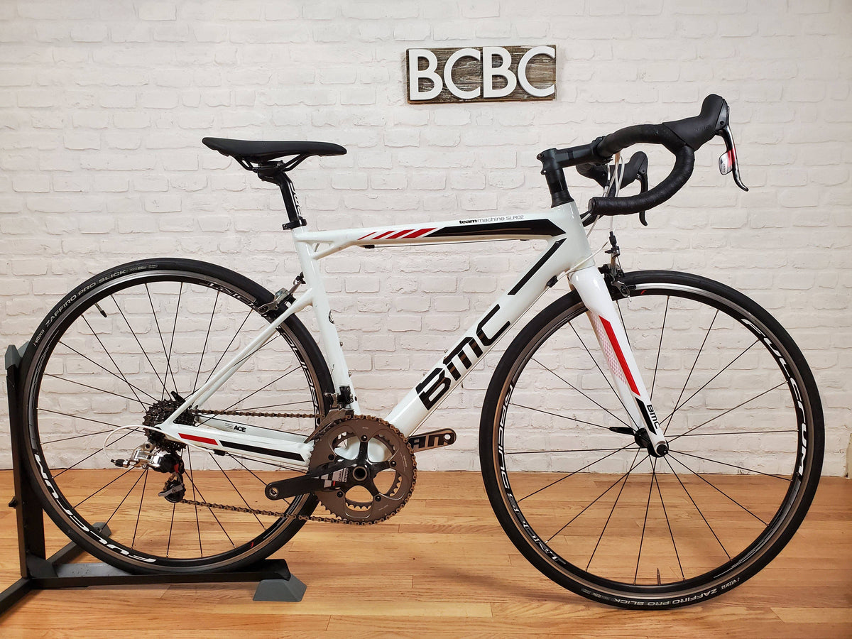 bmc rennrad 2017 TeamMachine SLR02 SRAM Red Kleur:Multicam Alpina Taunus MIPS Navy Handsker